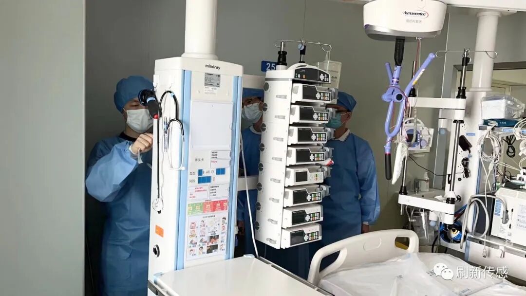 Deployment team preparing P20 monitoring equipment inside the hospital